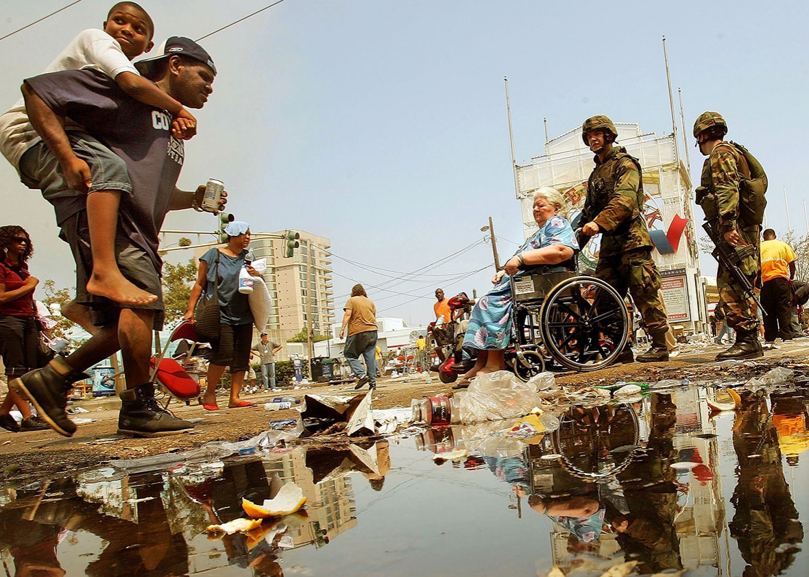 U.S. Army National Guard soldiers assist stranded victims of Hur